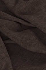 Digital linen chambray fabric, draped on floor with folds in it, dark mauve colour. 