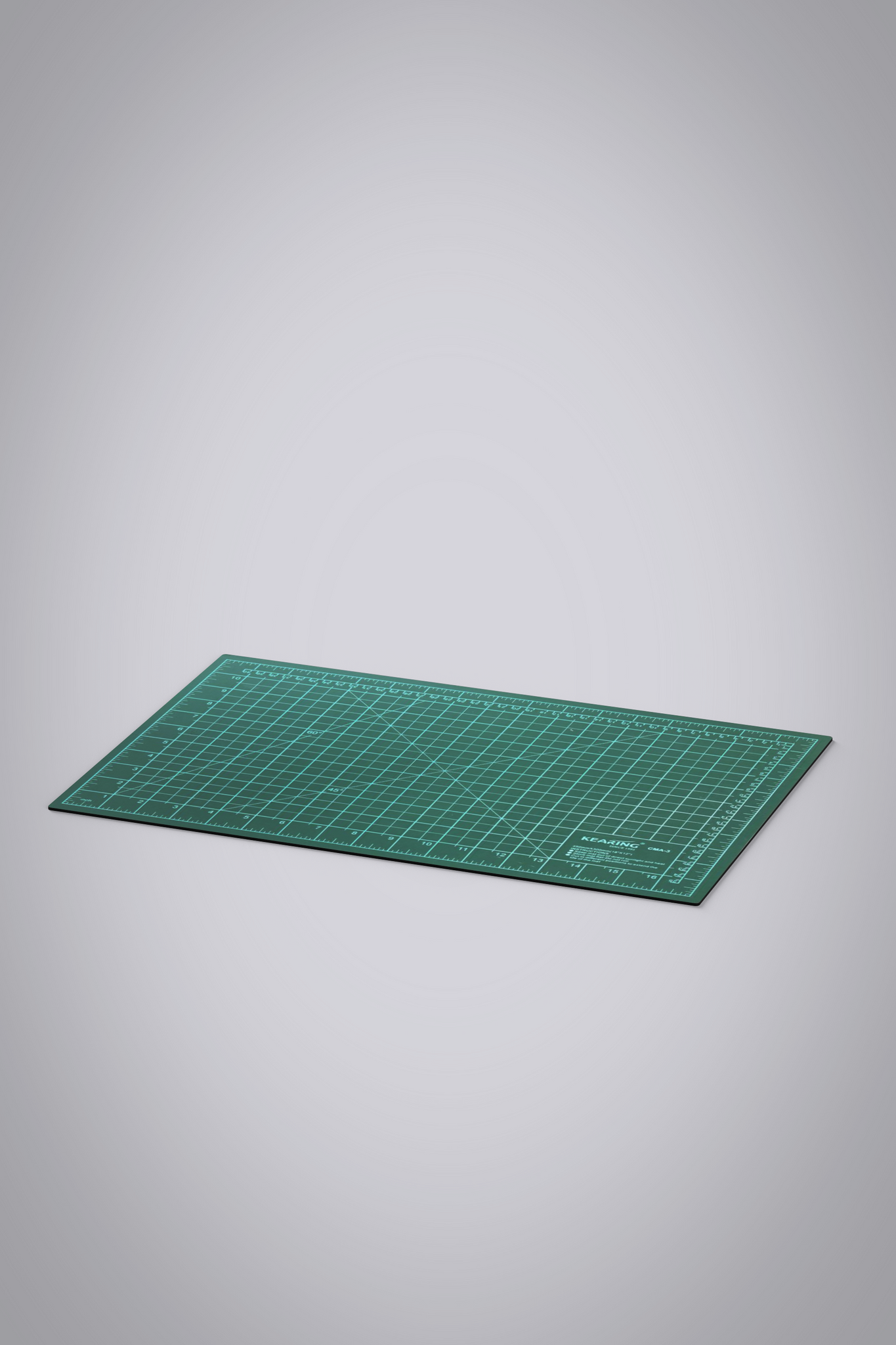 3D Object green self-healing cutting mat with measurement markings in white.