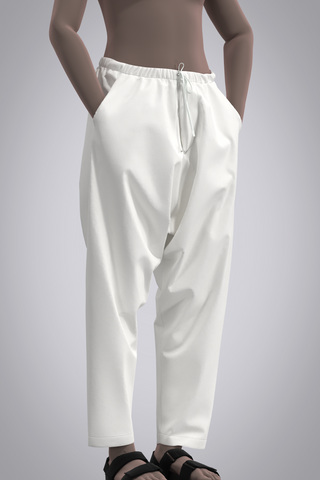 Female avatar wearing white drop crotch pants with elastic waist and drawstring, front quarter turn view with avatar's hands in pockets.