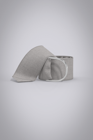 3D Linen fabric belt with silver d-ring closure, displayed coiled on grey gradient background.